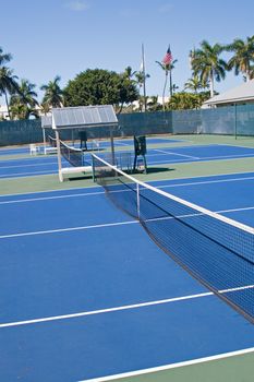 Resort tennis club and tennis courts with balls