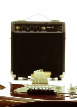 Electric guitar and amplifier isolated on the white backgroud