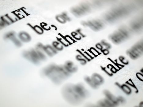 Detail of Shakespeare's Hamlet book page - selective focus