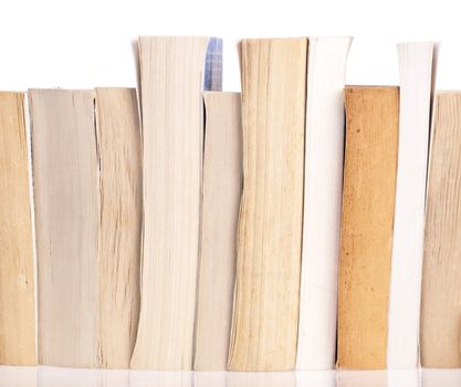 Stack of old books on a white background