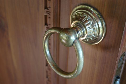 door handle made from bronze and metal