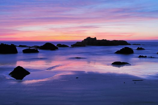 Boulders on the seashore in the evening