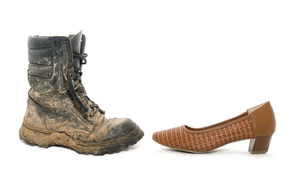 Dirty man boot and a woman shoe