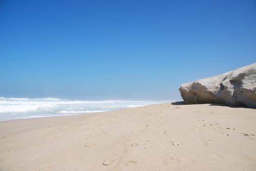 stunning beach scenery at Praia del Rey (blue sky)