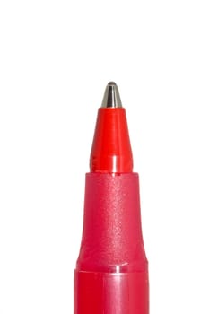 A close-up shot of a red ballpoint pen isolated on a white background