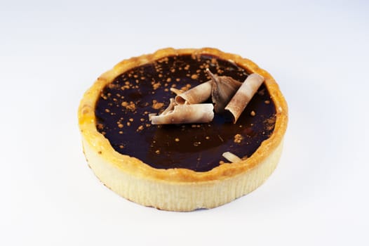 A single dark chocolate tart