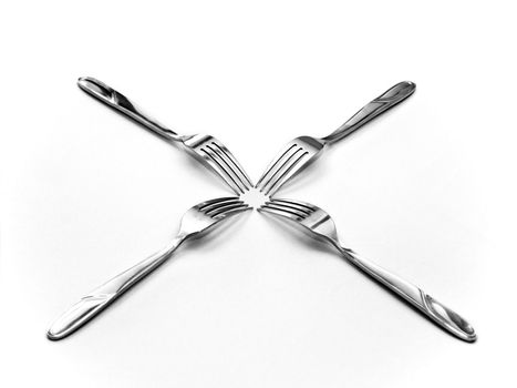 Four forks placed head to head