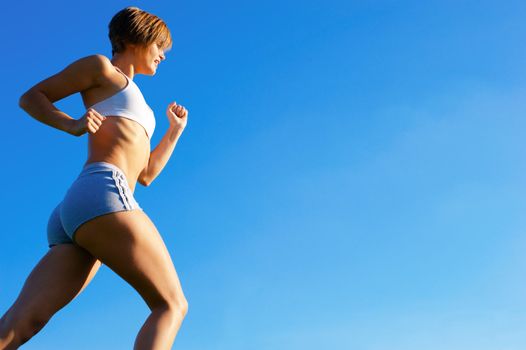 Fit young woman working out, from a complete series of photos.