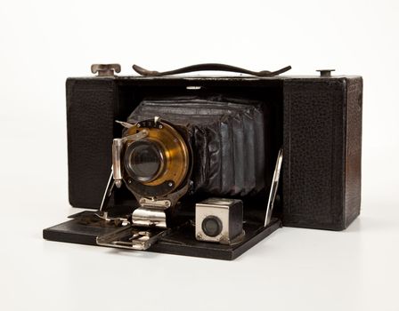 Antique bellows camera in side view isolated on white