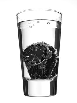 a glass with a clock inside