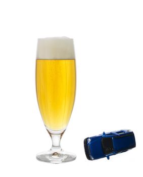 glass of beer and a car