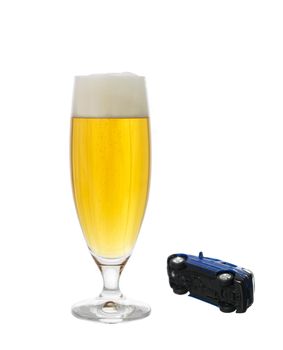 glass of beer and a car