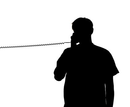 silhouette of a man talking in the phone