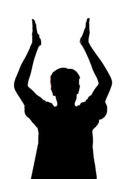 silhouette of a boy clapping his hands