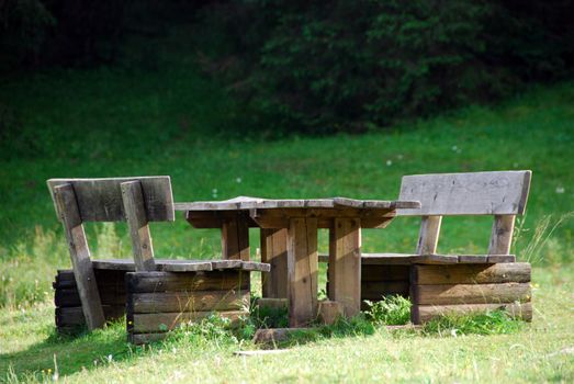 Isolated Bench on a Dolomites Park in Veneto
