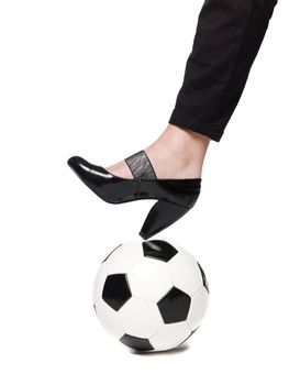 Fotball and a lady`s slipper