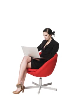 Woman in a chair with a computer