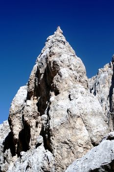 Mountain peak on blue sky background