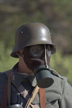 World war soldier with gas mask and helmet