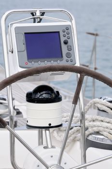 Rudder, compass and GPS on a sailboat