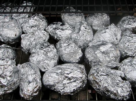 potatoes in tinfoil on the grill