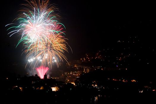 Photo of a bright and colorful fireworks display on a holiday.