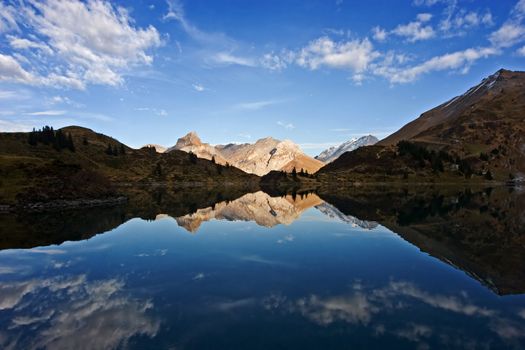 Mountain reflection on Tr�bsee, Switzerland