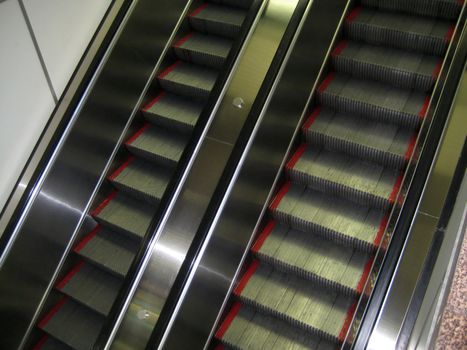 Escalator or Stairs that are going up and down.