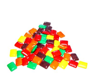Colored Chewing Gum in a pile isolated on a white background. 
