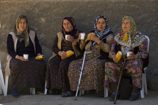 Turkish women having lunch in the street of Ankara