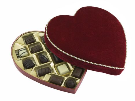 Opened box of valentines chocolates isolated on white