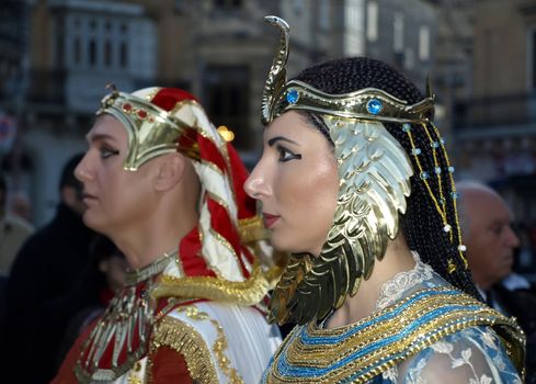 Woman dressed up as Queen Cleopatra during reenactment of Biblical times  