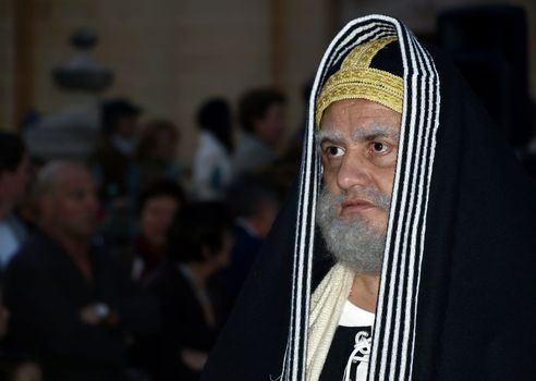 Various Biblical figures from the passion of the Christ during the good Friday procession in Luqa in Malta  