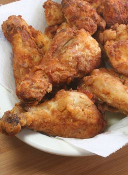 Southern style fried chicken in platter.
