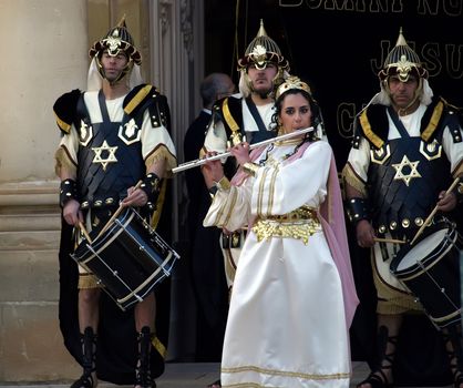 Various Biblical figures from the passion of the Christ during the good Friday procession in Luqa in Malta  