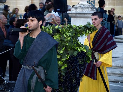 Various Biblical figures from the passion of the Christ during the good Friday procession in Luqa in Malta  