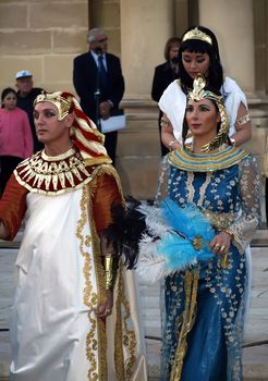 People dressed up as Egyptian rulers during reenactment of Biblical times  