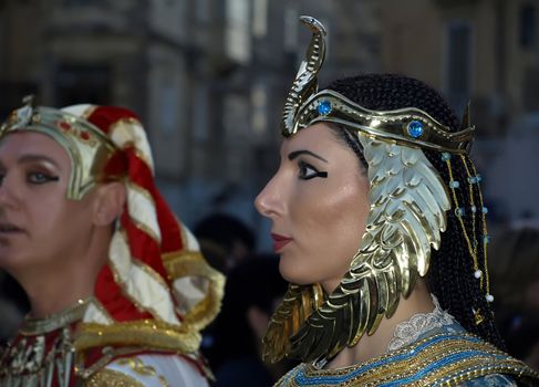 Woman dressed up as Queen Cleopatra during reenactment of Biblical times  