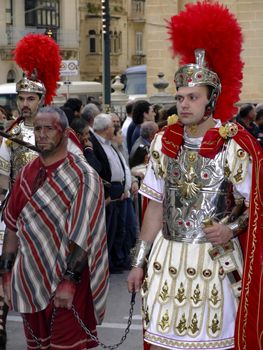 SPQR Series - Imagery depicting re-enactment of Roman Empire legion march, during Good Friday procession in Malta. No detail is spared, resulting in realistic weaponry and uniforms.