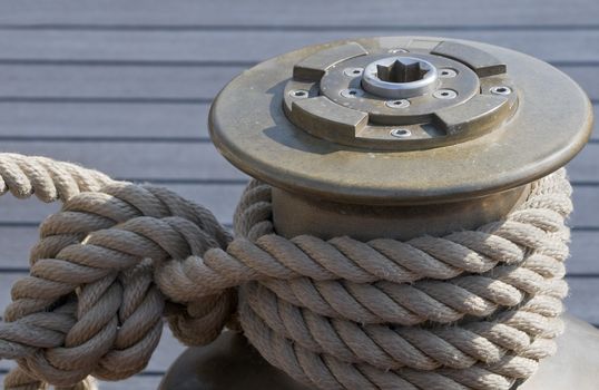 Rope tie up on a winch of a sailboat