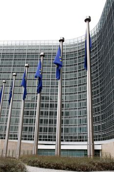 European flags in front of the European commission building in Brussels.