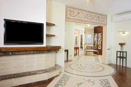 Spacious hall with a beautiful mosaic ornament on a floor