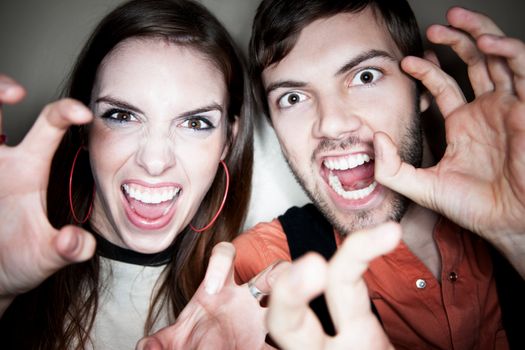 Crazy Couple Using their Hands as Claws