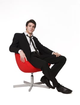 Man in red armchair
