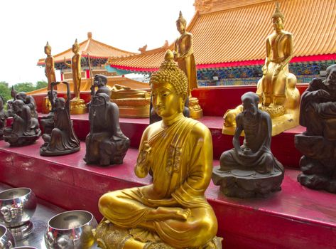 Budha statue with many asian god.