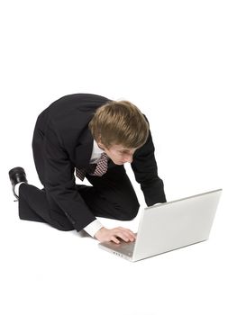 Man on the floor with a computer