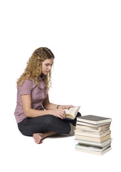 Woman siting on the floor reading