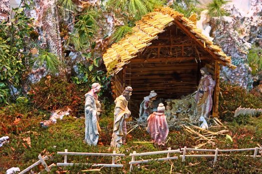 Christmas nativity scene of jesus birth in an old cottage