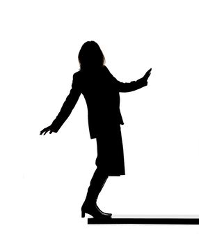 Silhouette of a woman on a board