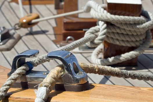 Close-up of ropes on a wooden sailboat 